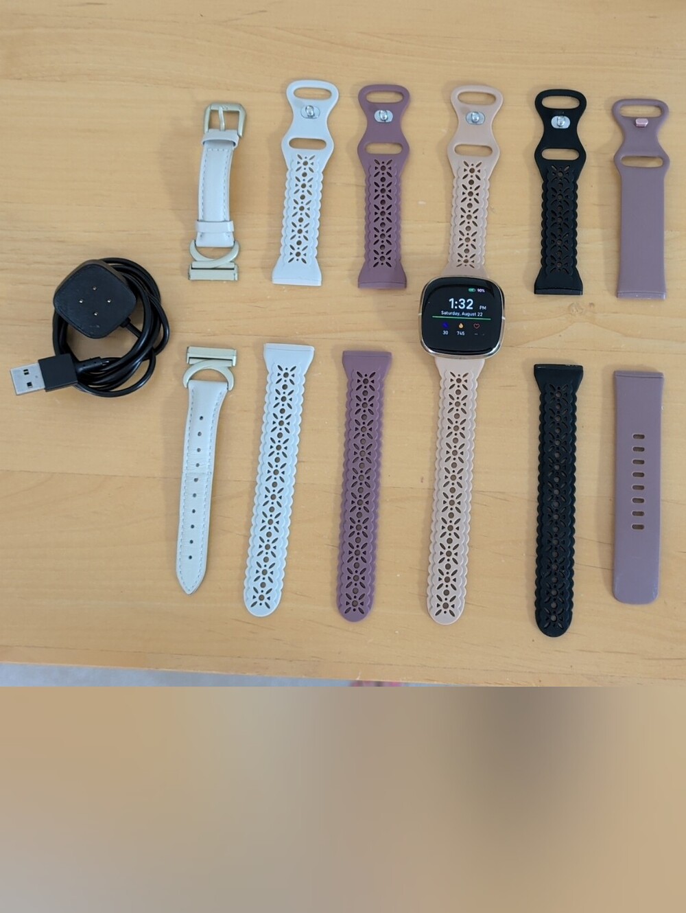 Fitbit Sense smartwatch, mixed band set, and charger